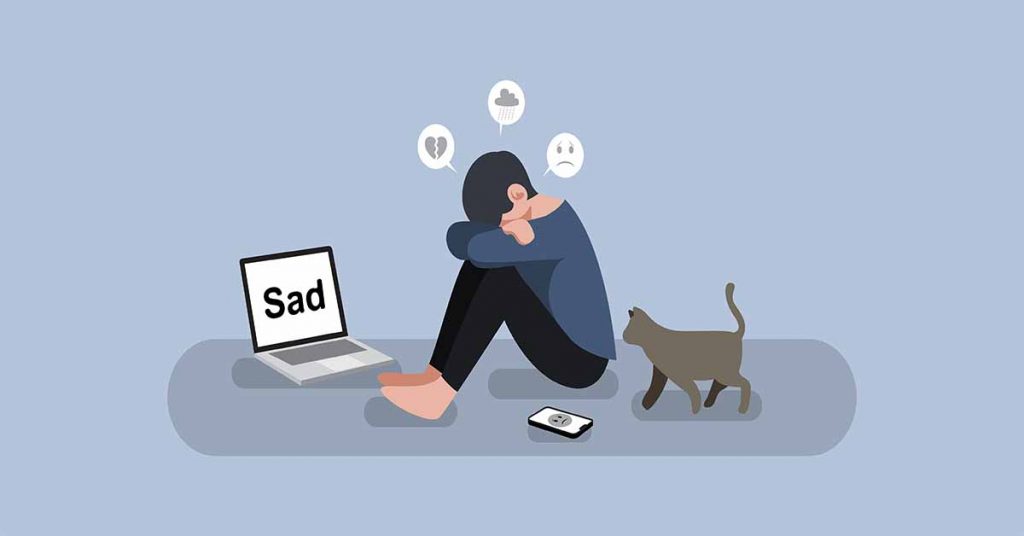 CBD oil for depression and anxiety. Image of unhappy man sit on the floor with laptop, phone and a cat, sad, depression and heartbroken or anxiety